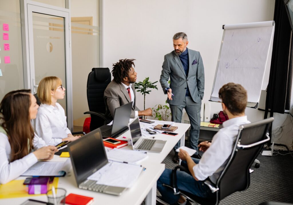 Healthcare practice team meeting to review growth and operations